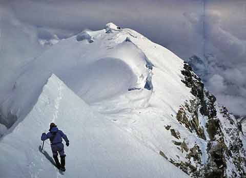 
Shishapangma Southwest Face First Ascent May 28 1982: Alex MacIntyre returns along the Central Summit ridge. Roger Baxter-Jones is seen as a tiny dot on the shoulder below the final humps of the Shishapangma Main Summit. - Shisha Pangma: The Alpine-Style First Ascent Of The South-West Face book
